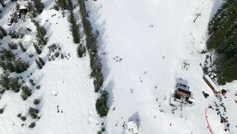 Aerial-looking-down-at-a-snow-covered-ski-resort