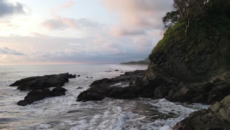 Drone-flying-over-rocks-and-Pacific-Ocean-on-the-coast-of-Costa-Rica