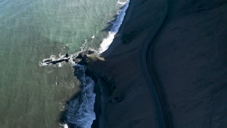 Aerial-tilt-down-shot-of-Hvalnesskriður-a-steep-mountain-in-the-south-east-part-of-Iceland