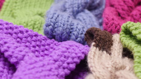 Knitted-yarn-pieces-colorful-panning-close-up
