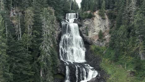 Stunning-Waterfalls-With-Dense-Coniferous-Forest-In-British-Columbia,-Canada