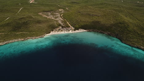 High-altitude-drone-shot-at-the-caribbean-beach-of-the-Kenepa-in-Curacao-island
