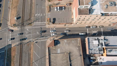 Aerial-Above-Car-Traffic-In-City-Center-Multi-Lane-Road,-Durham-USA
