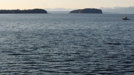 Alaska-Icy-Strait-Point,-Hoonah-Outer-Coast,-Fishing-boat-passing