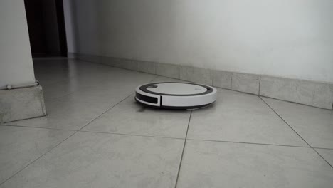 Robot-vacuum-cleaner-in-the-living-room-of-a-house