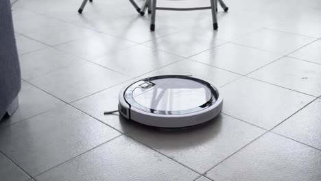 robot-vacuum-cleaner-under-the-chair