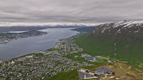 Tromsø-Norway-Aerial-V17-Panorama-View-Flyover-Storsteinen-Mountain-Capturing-Fjellstua-Seilbahn,-Stadtbild-Tromsdalen,-Insel-Tromsøya-Und-Berglandschaften-–-Aufgenommen-Mit-Mavic-3-Cine-–-Juni-2022