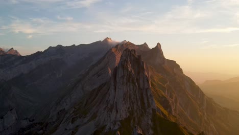 Drone-Flying-Along-Schafler-Ridge-in-the-Appenzell-Region-of-the-Swiss-Alps-in-Switzerland-During-Sunset