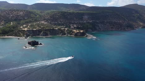 Speedboat-in-Akamas-blue-lagoon,-Cyprus