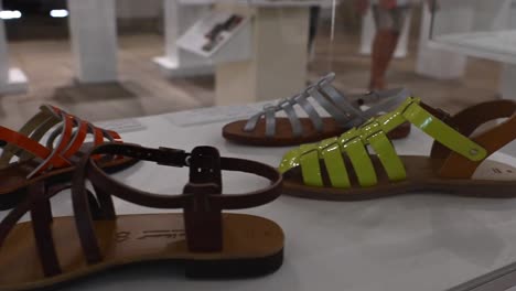 Sandals-with-colorful-straps-in-a-fashion-museum,-casual-shoes