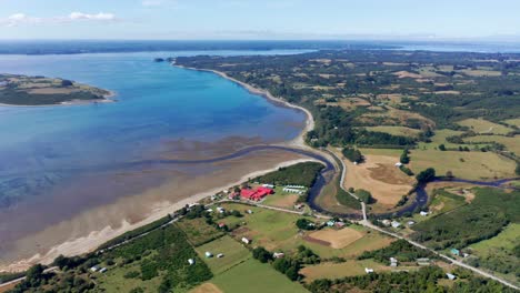 Aerial-View-Of-Caulín-Bay-Located-In-Northern-End-Of-Chiloé-Island-In-Chile