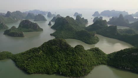 aerial-of-beautiful-landscape-of-limestone-mountain-cliffs-in-Ha-Long-Bay-Vietnam-on-hazy-morning