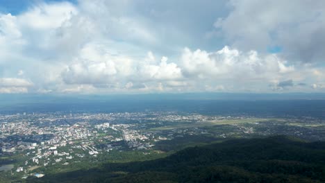 Forward,-flying-from-Doi-Suthep-in-Thailand-toward-panorama-of-city