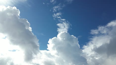 Pan-over-beautiful-cloudy-sky,-looking-up