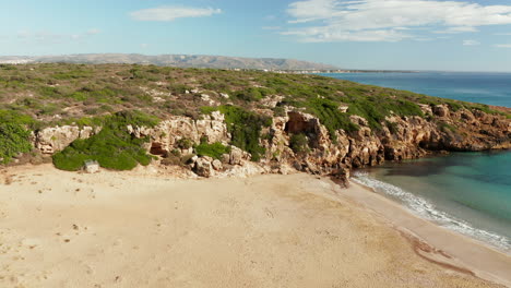 Landscape-Of-Calamosche-Beach-In-Vendicari-Nature-Reserve-In-Sicily,-Italy---drone-shot