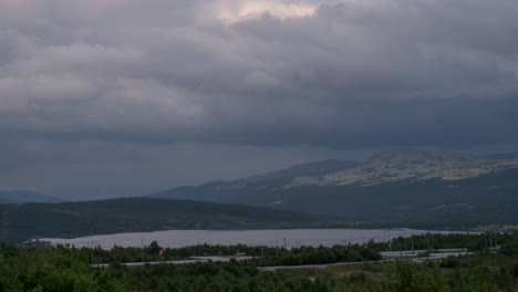 Time-lapse-of-dark-grey-storm-clouds-blowing-over-Dovre-Mountains-Norway