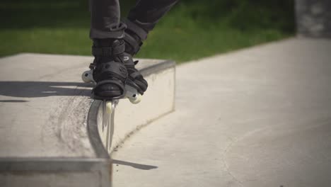 A-slow-motion-of-a-guy-doing-a-trick-while-rollerblading-captured-in-a-skate-park