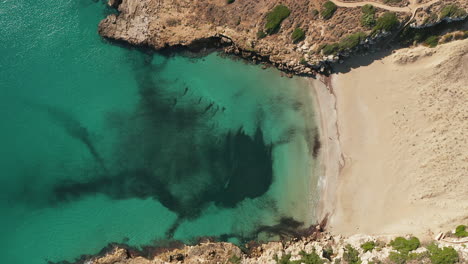 Top-Down-View-Of-Calamosche-Beach-In-Vendicari-Natural-Reserve-In-Sicily,-Italy---drone-shot