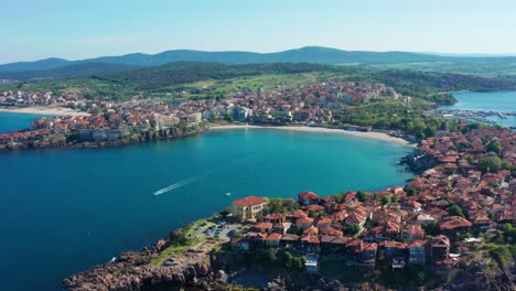 Aerial-view-of-Sozopol-old-town-with-boat-between-the-coasts