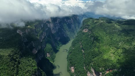 Flying-high-over-the-Grijalva-river-in-the-Sumidero-Canyon-in-Chiapas,-Mexico---Aerial-view