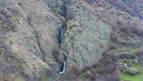 Aerial-view-of-waterfall-hidden-between-rocks-near-Sopot-Bulgaria