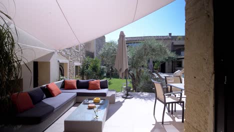 Slow-revealing-shot-of-a-luxury-garden-with-a-seating-area-and-private-pool