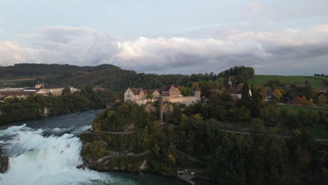 Fantastic-panoramic-aerial-shot-in-the-middle-distance-to-the-falls-of-the-Rhine-and-where-the-castle-of-Laufen-can-be-seen