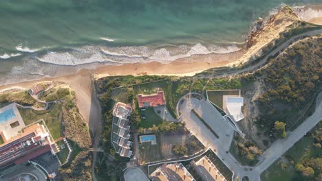 Top-down-aerial-View-of-the-Coastline-in-coastal-town-of-Conil-de-la-Frontera