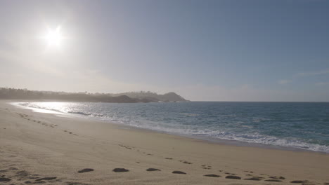 Slow-motion-shot-of-a-sunny-beach-day-at-California-Monterey-Bay-Marina-State-Beach