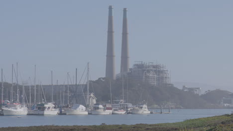 Slow-motion-shot-of-sail-boats-located-in-Moss-Landing-Harbor-California