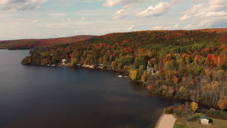 Aerial-View-Of-Big-Lake-With-Autumn-Forest-Colours-Of-Algonquin-Provincial-Park