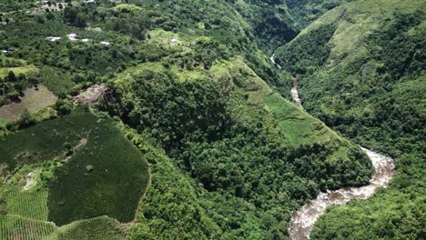 Aerial-view-above-Magdalena-San-Agustin-lush-green-woodland-winding-valleys-in-Andes-mountains