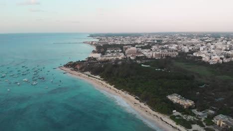 Beautiful-aerial-360-view-of-Playa-Avenida-Colosio-beach-in-the-Mexican-coastal-town-of-Playa-del-Carmen,-Quintana-Roo