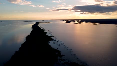 flying-over-an-island-in-the-middle-of-the-Parana-River-at-sunset---Brazil
