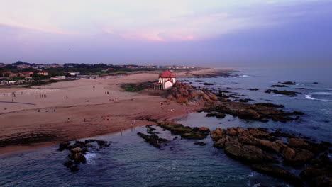 Aerial-view-of-a-small-temple-on-the-shore-of-the-Atlantic-Ocean-in-the-North-of-Portugal