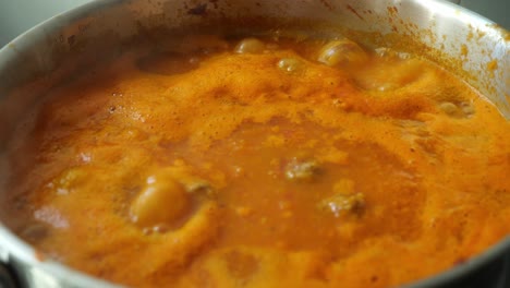 Close-Up-View-Of-Tomato-Soup-Is-Bubbling-In-A-Pan