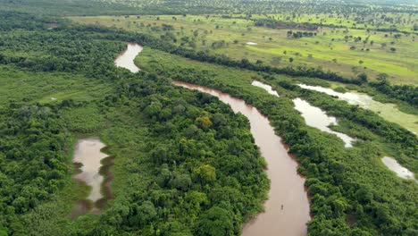 Panoramic-view-of-a-boat-in-a-river-of-Pantanal,-Mato-Grosso-do-Sul---Brazil