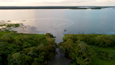 drone-shot-flying-over-Parana-river-in-sunset-time
