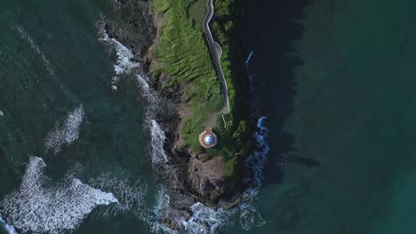 Aerial-overhead-shot-of-island-with-crashing-waves-at-Senator-Resort-in-Puerto-Plata