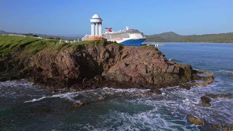 Romantic-gazebo-on-rocky-promontory-of-Senator-Puerto-Plata-Spa-Resort-with-cruise-ship-in-background,-Dominican-Republic