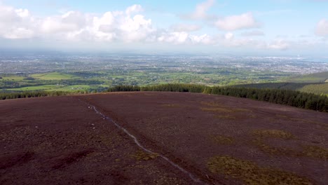 flying-over-top-of-the-mountain-with-the-city-on-background---Dublin,-Ireland