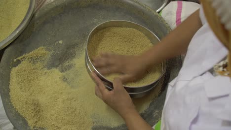 A-woman-preparing-moroccan-couscous