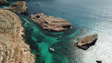Crystal-lagoon-with-crystal-clear-water-in-Malta---ship-crossing