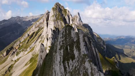 Slow-pan-up-flyover-above-Schafler-Ridge-Appenzell,-Swizterland-during-the-day-in-summer
