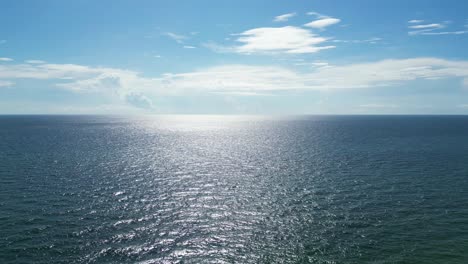 Rising-drone-shot-looking-at-the-ocean-and-horizon