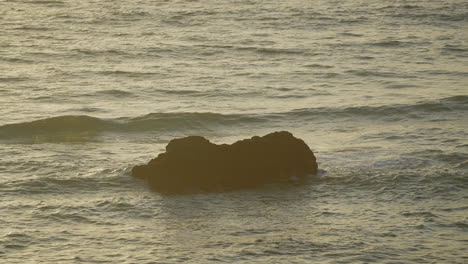 Rock-formation-in-the-middle-of-the-ocean