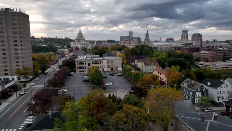 aerial-push-over-fall-leaves-and-foliage-toward-the-state-capital-in-providence-rhode-island