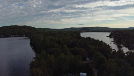 Aerial-shot-over-a-lake-in-Quebec,-Canada