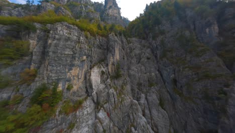 Drone-reaching-a-mountain-top-in-Theth,-Albania
