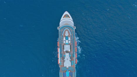 Incredible-drone-footage-of-stately-cruise-ship-navigating-in-blue-sea-waters